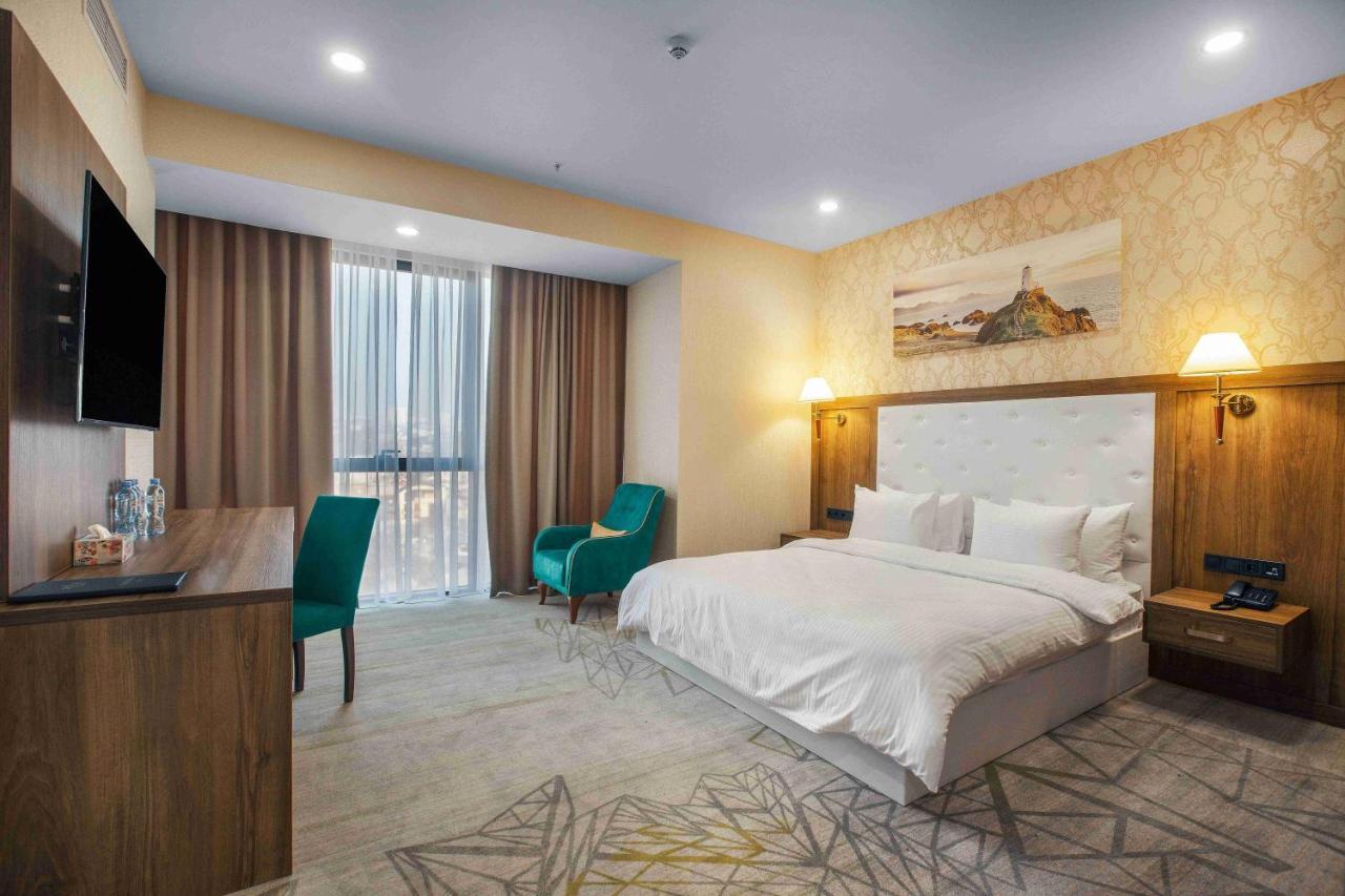 Royal Tulip Hotel & Casino, Tbilisi Ngoại thất bức ảnh Deluxe room